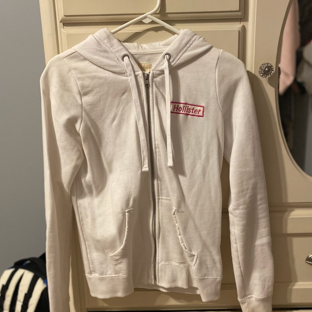 Hollister white zip up with pink logo